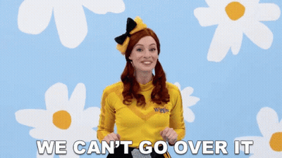 Woman In Yellow Outfit Saying Can't Go Over It GIF