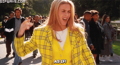 Woman In Yellow Plaid Jacket Facing Crowd GIF