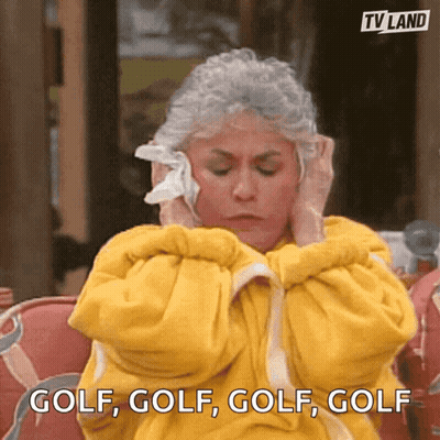 Woman In Yellow Robe Covering Ears Saying Golf GIF
