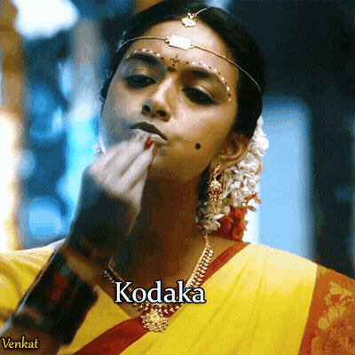 Woman In Yellow Saree With Kodaka Necklace GIF