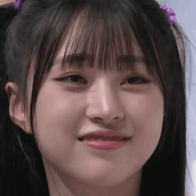 Woman In Yellow Shirt And Black Jacket Funny Face GIF