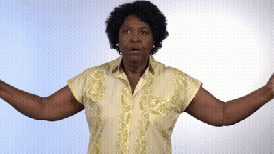 Woman In Yellow Shirt Arms Wide Open GIF