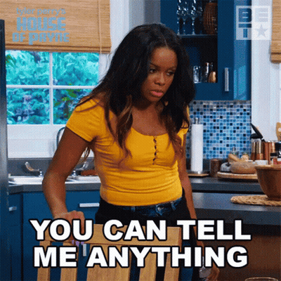 Woman In Yellow Shirt Saying You Can Tell Me Anything GIF