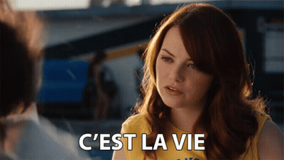 Woman in Yellow Shirt Says C'est La Vie