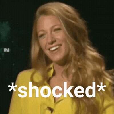 Woman In Yellow Shirt Shocked GIF
