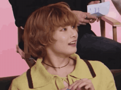 Woman In Yellow Shirt Sitting GIF