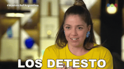 Woman In Yellow Shirt Smiling Saying Los Detesto GIF