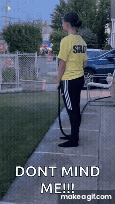 Woman In Yellow Shirt With Shit GIF