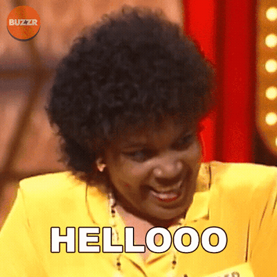 Woman In Yellow Suit Saying Hellooo GIF
