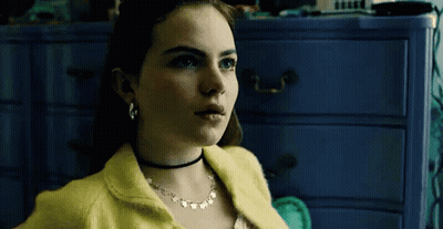 Woman In Yellow Sweater And Choker GIF