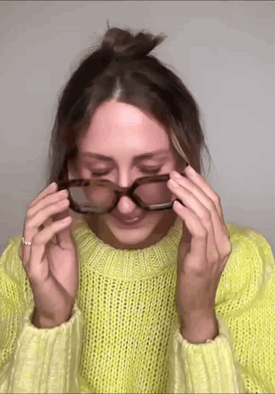 Woman In Yellow Sweater And Glasses GIF