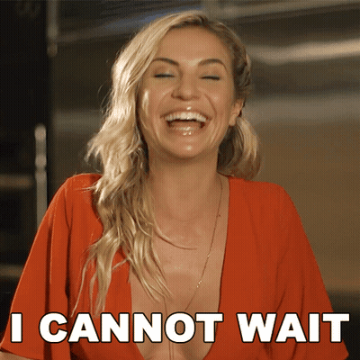 Woman In Yellow Sweater In Red Car GIF
