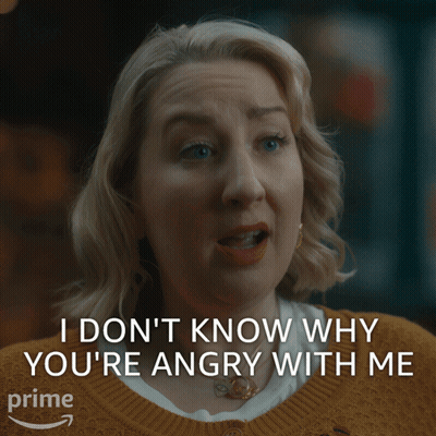 Woman In Yellow Sweater Says I Don't Know Why You're Angry With Me GIF