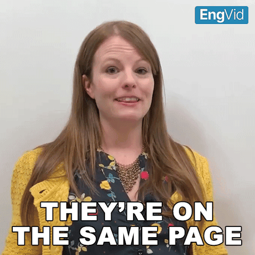 Woman In Yellow Sweater Says They're On The Same Page GIF