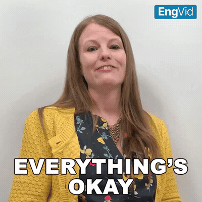 Woman In Yellow Sweater Smiling Says Everything's Okay GIF