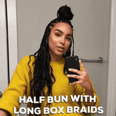 Woman In Yellow Sweater Taking Selfie In Mirror GIF