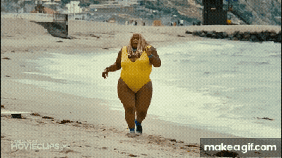Woman In Yellow Swimsuit Running On Beach GIF