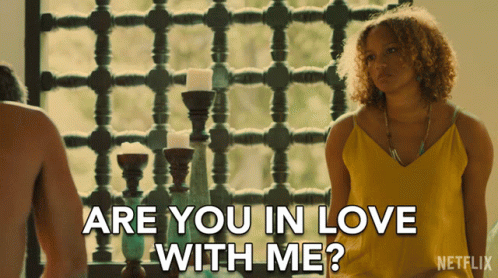 Woman In Yellow Tank Top Asking About Love GIF