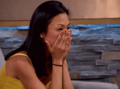 Woman In Yellow Tank Top Covering Face GIF