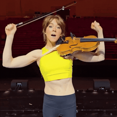 Woman In Yellow Tank Top Holding Violin GIF