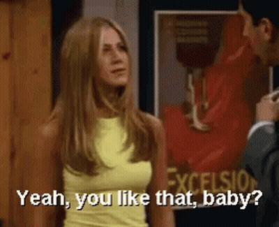 Woman In Yellow Tank Top Says Yeah You Like That Baby To Man In Suit GIF