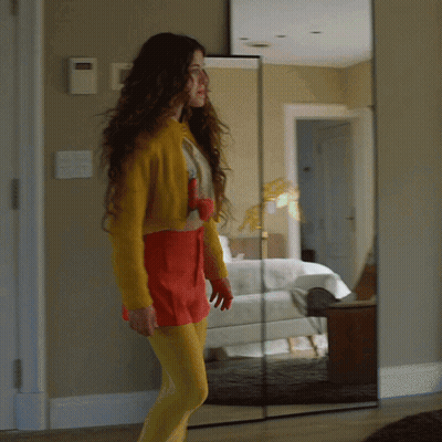 Woman in Yellow Tights in Front of Mirror