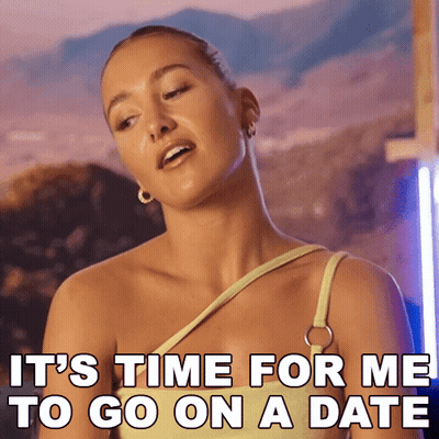 Woman In Yellow Top Saying It's Time For Date GIF