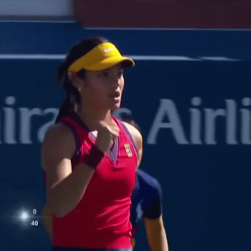 Woman In Yellow Visor Saying Lets Go GIF
