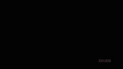 Woman In Zeus T-Shirt Holding Ponytail GIF
