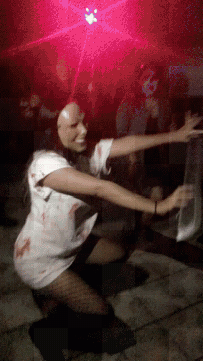 Woman in Zombie Costume Kneeling