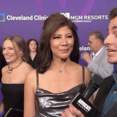 Woman Interviewed By Man With Advocate Channel Microphone GIF