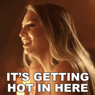 Woman It's Getting Hot In Here GIF
