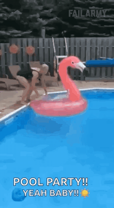 Woman Jumping Into Pool With Flamingo Float GIF
