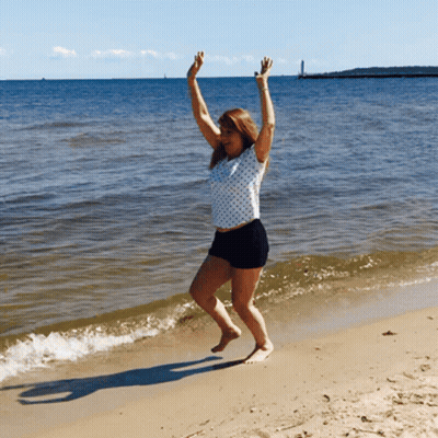 Woman Jumping On Beach GIF