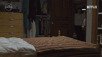 Woman Jumping On Bed With Netflix Logo GIF