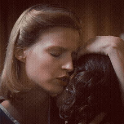 Woman Kissing Another Woman On Forehead GIF