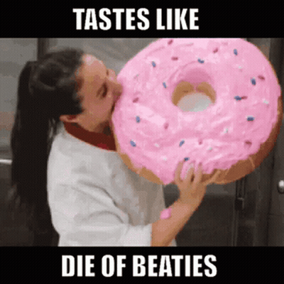 Woman Kissing Giant Pink Donut Tastes Like Die Of Beaties GIF