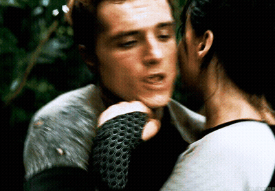 Woman Kissing Man On Cheek GIF