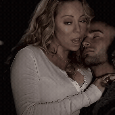 Woman Kissing Man's Neck In Dark Room GIF