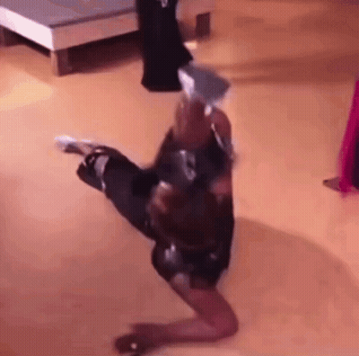Woman Kneeling Holding Bottle GIF