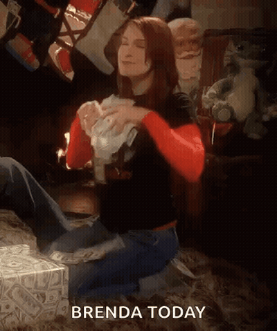 Woman Kneeling In Front Of Money Saying Brenda Today GIF