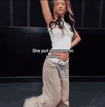 Woman Kneeling With Yellow Name GIF