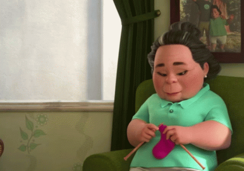 Woman Knitting Green Socks GIF
