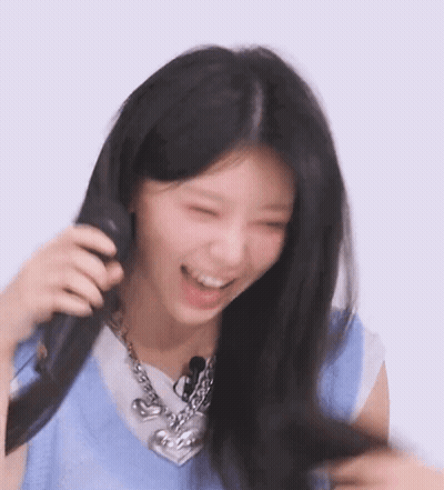 Woman Laughing And Holding Microphone GIF