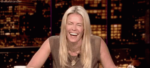 Woman Laughing At Night City GIF