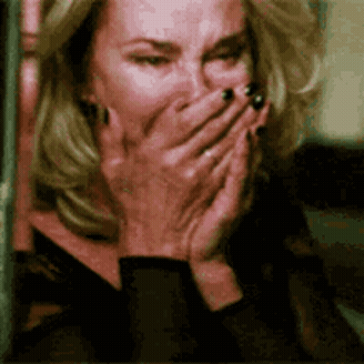 Woman Laughing Covering Mouth With Hands GIF