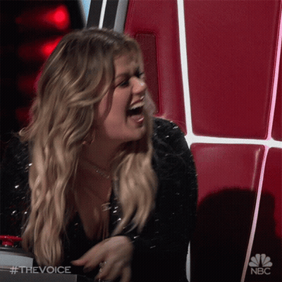 Woman Laughing In Chair With NBC Logo GIF