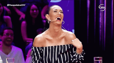 Woman Laughing In Front Of Crowd On TV Show GIF