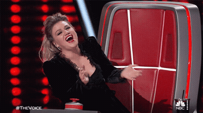Woman Laughing In Front Of NBC Television GIF