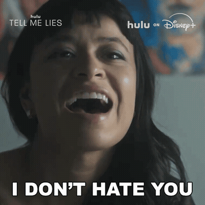 Woman Laughing Saying I Don't Hate You GIF